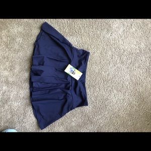 Halara tennis skirt with built in shorts (skort) medium (M)